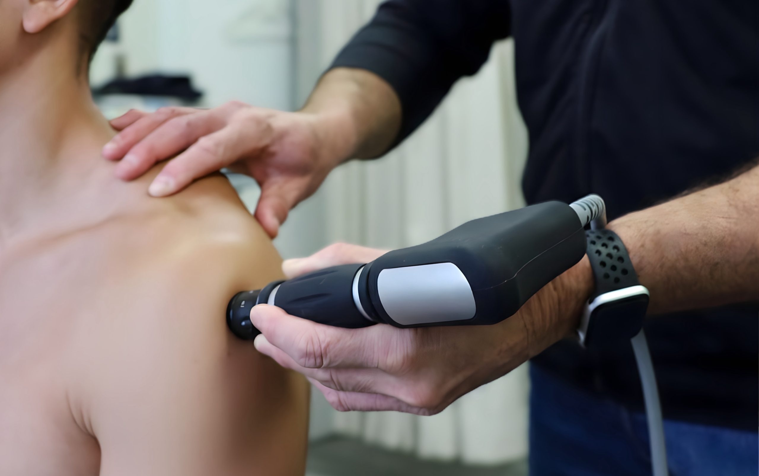 BIOFLEX Shockwave therapy applied to the shoulder during treatment